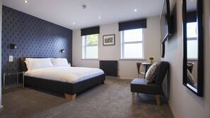 Egyptian cotton sheets, hypo-allergenic bedding, desk, blackout curtains