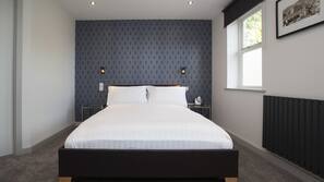 Egyptian cotton sheets, hypo-allergenic bedding, desk, blackout curtains
