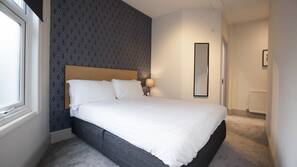 Egyptian cotton sheets, hypo-allergenic bedding, desk, blackout curtains