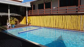Outdoor pool, pool umbrellas, sun loungers