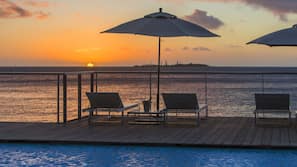 Outdoor pool, pool umbrellas, pool loungers