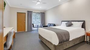 Minibar, desk, laptop workspace, iron/ironing board