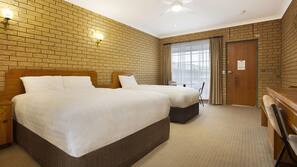 Minibar, desk, laptop workspace, iron/ironing board