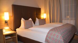 Literie hypoallergénique, surmatelas, minibar