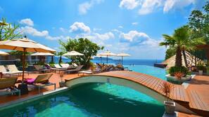 2 outdoor pools, pool umbrellas, pool loungers