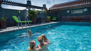 Outdoor pool, pool umbrellas, sun loungers