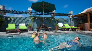 Outdoor pool, pool umbrellas, sun loungers
