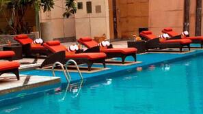 Outdoor pool, pool umbrellas, pool loungers