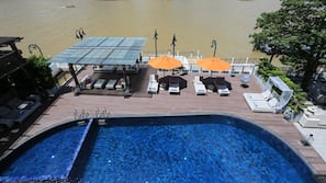 Outdoor pool, open 6:00 AM to 9:00 PM, pool umbrellas, sun loungers