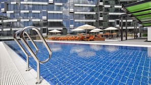 Outdoor pool, pool umbrellas, sun loungers
