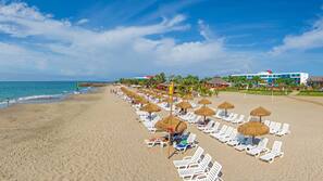 Private beach, sun loungers, beach towels, beach volleyball