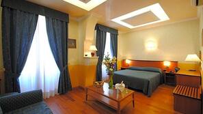 Pillowtop beds, desk, blackout drapes, iron/ironing board