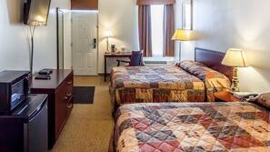 Pillowtop beds, desk, blackout drapes, iron/ironing board