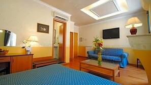 Pillowtop beds, desk, blackout drapes, iron/ironing board