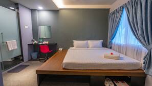 In-room safe, desk, laptop workspace, blackout curtains