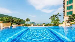 Outdoor pool, pool umbrellas, sun loungers