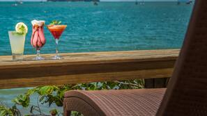 On the beach, white sand, sun-loungers, beach umbrellas