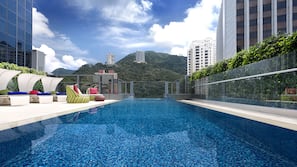 Outdoor pool, pool umbrellas, pool loungers