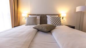 Hypoallergeen beddengoed, een minibar, een kluis op de kamer