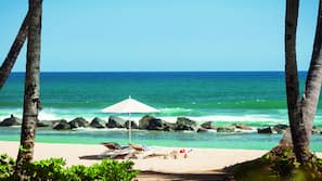 On the beach, beach cabanas, sun loungers, beach umbrellas
