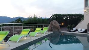 Outdoor pool, pool loungers