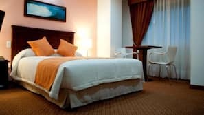 Hypo-allergenic bedding, down duvet, minibar, in-room safe