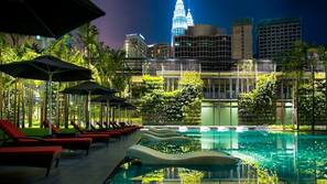 Outdoor pool, open 7:00 AM to 10:00 PM, free pool cabanas