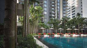 Outdoor pool, open 7:00 AM to 10:00 PM, free pool cabanas