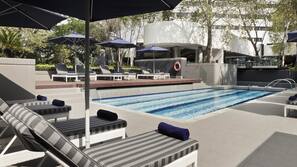 Outdoor pool, pool umbrellas, pool loungers