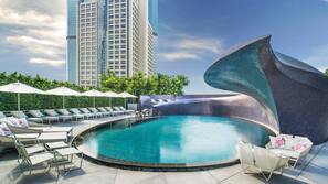 Outdoor pool, pool umbrellas, sun loungers