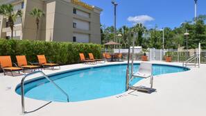 Outdoor pool, pool umbrellas, sun loungers