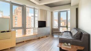Premium bedding, down comforters, minibar, in-room safe