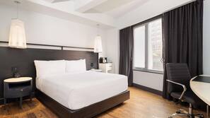 Premium bedding, down comforters, minibar, in-room safe