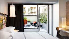 Premium bedding, down comforters, minibar, in-room safe