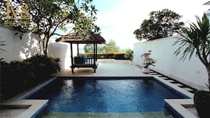 Outdoor pool, free pool cabanas, pool umbrellas