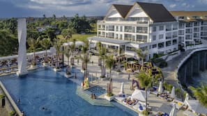 Outdoor pool, free pool cabanas, pool umbrellas