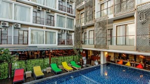 Outdoor pool, pool umbrellas, pool loungers