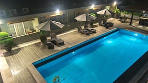Outdoor pool, pool umbrellas, sun loungers