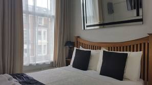 Memory foam beds, iron/ironing board, free WiFi, linens