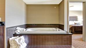 Hypo-allergenic bedding, desk, laptop workspace, blackout curtains