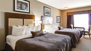 Hypo-allergenic bedding, desk, laptop workspace, blackout curtains