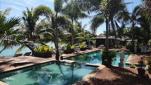 Outdoor pool, open 6:00 AM to 11:00 PM, sun loungers
