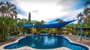 Outdoor pool, open 7 AM to 9 PM, pool umbrellas, sun loungers