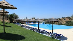 Seasonal outdoor pool, open 8:00 AM to 9:00 PM, free pool cabanas