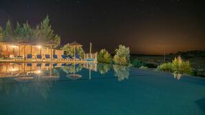 Seasonal outdoor pool, open 8:00 AM to 9:00 PM, free pool cabanas