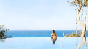 Outdoor pool, pool umbrellas, pool loungers