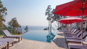 Outdoor pool, pool umbrellas, pool loungers