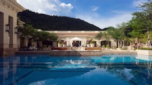 Indoor pool, outdoor pool, open 7:00 AM to 11:00 PM, pool umbrellas