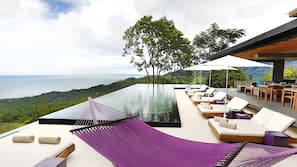Outdoor pool, pool umbrellas, sun loungers