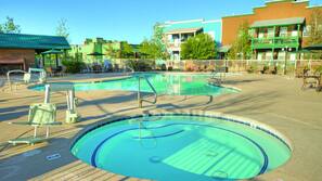 Outdoor pool, pool umbrellas, sun loungers